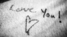 Lorrie Dingman 'Love You!' tattoo black and white