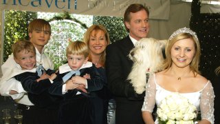 In this file photo, actors (L to R) David Gallagher, twins Lorenzo and Nikolas Brino, Catherine Hicks, Stephen Collins and Beverley Mitchell pose at a reception to celebrate 150 episodes of The WB's "7th Heaven" on February 20, 2003 in Los Angeles, California.