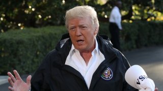 In this file photo, U.S. President Donald Trump speaks to the media before boarding Marine One to depart from the White House, on October 3, 2017 in Washington, D.C.