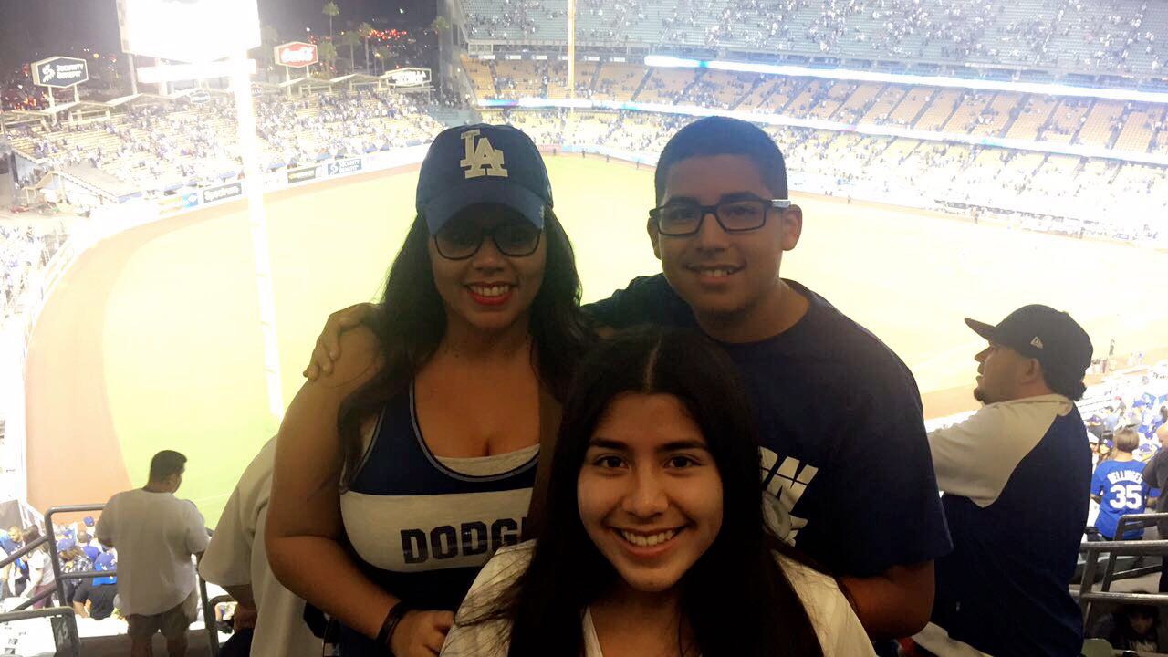 The Guzman family was all smiles as they watched the Dodgers beat the Arizo...