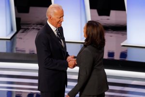 Kamala Harris and Joe Biden shake hands.