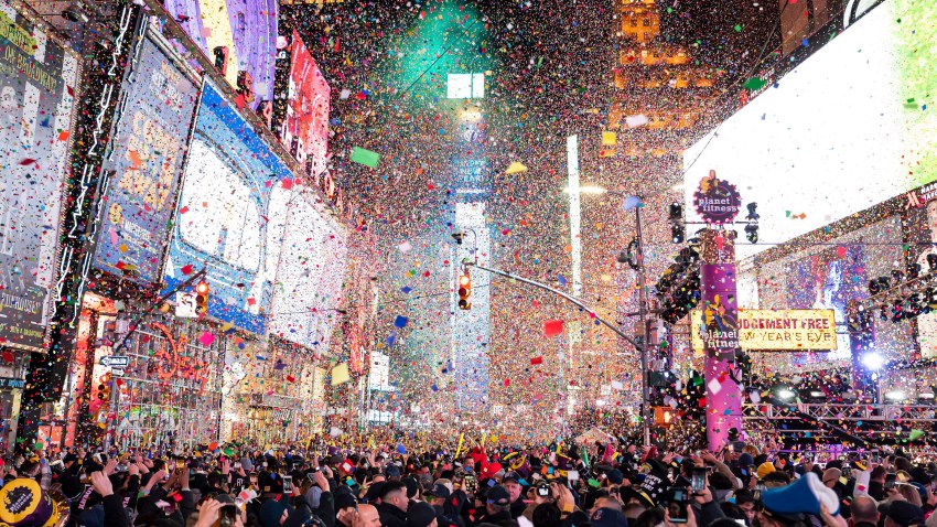 In this Jan. 1, 2020, file photo, confetti falls at midnight on the Times Square New Year's Eve celebration in New York.
