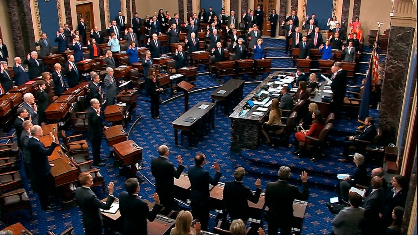 In this image from video, presiding officer Supreme Court Chief Justice John Roberts swears in members of the Senate for the impeachment trial against President Donald Trump at the U.S. Capitol in Washington, Thursday, Jan. 16, 2020.