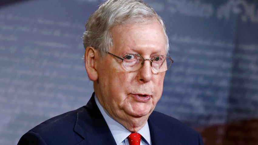 Senate Majority Leader Mitch McConnell of Ky., speaks with reporters after the Senate approved a nearly $500 billion coronavirus aid bill, Tuesday, April 21, 2020, on Capitol Hill in Washington.