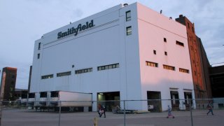 Employees of two departments at the Smithfield pork processing plant in Sioux Falls, S.D. report to work on Monday, May 4, 2020, as the plant moved to reopen after a coronavirus outbreak infected workers.