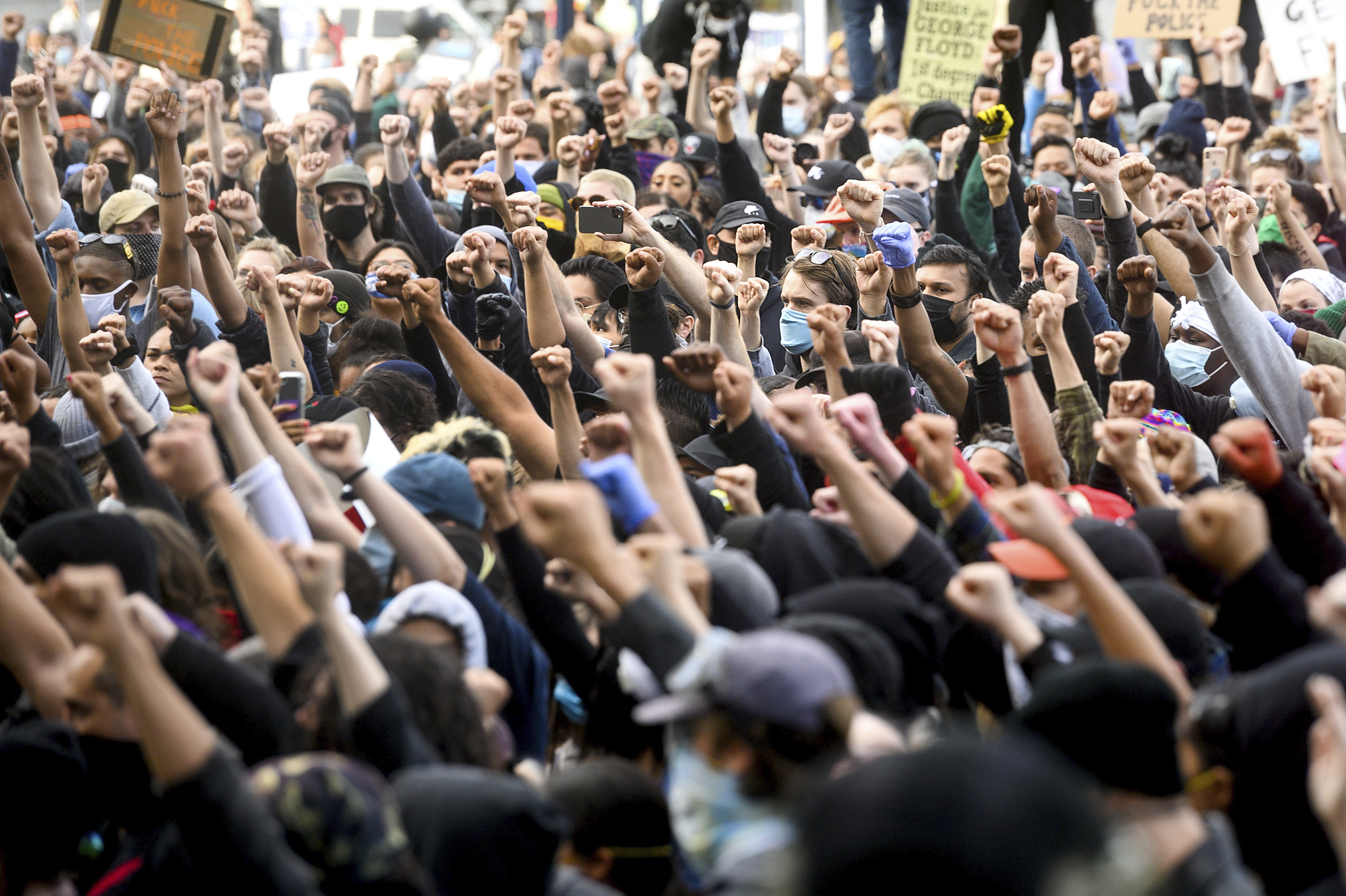 Demonstrators rally in San Francisco on Sunday, May 31, 2020, protesting the death of George Floyd, who died after being restrained by Minneapolis police officers on May 25.