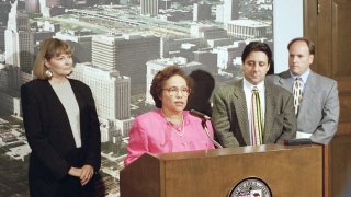 Gini Barrett, Rita Walters and Frank Scherma at a 1996 news conference
