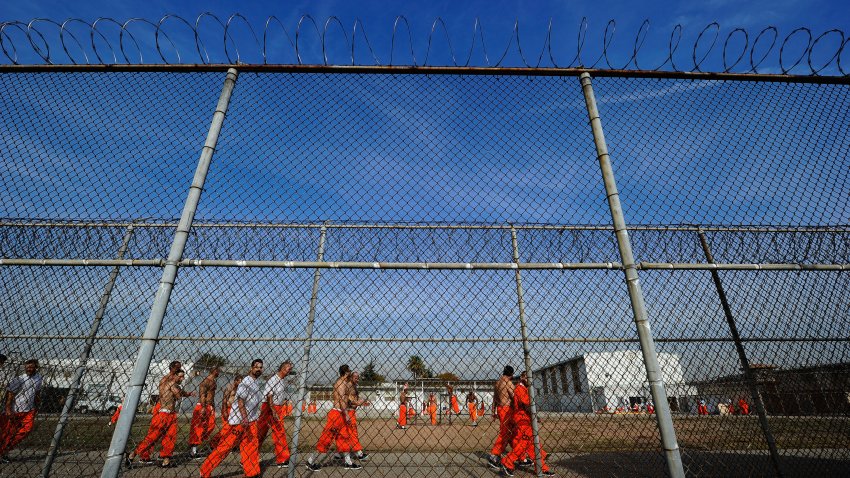 CHINO, CA – DECEMBER 10:  Inmates at Chino State Prison exercise in the yard December 10, 2010 in Chino, California. The U.S. Supreme Court is preparing to hear arguments to appeal a federal court’s ruling last year that the California state prison system would have to release 40,000 prisoners to cope with overcrowding so severe that it violated their human rights. More than 144,000 inmates are currently incarcerated in prisons that were designed to hold about 80,000.  (Photo by Kevork Djansezian/Getty Images)