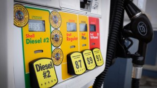 FILE - The national average gas price per gallon of regular gasoline