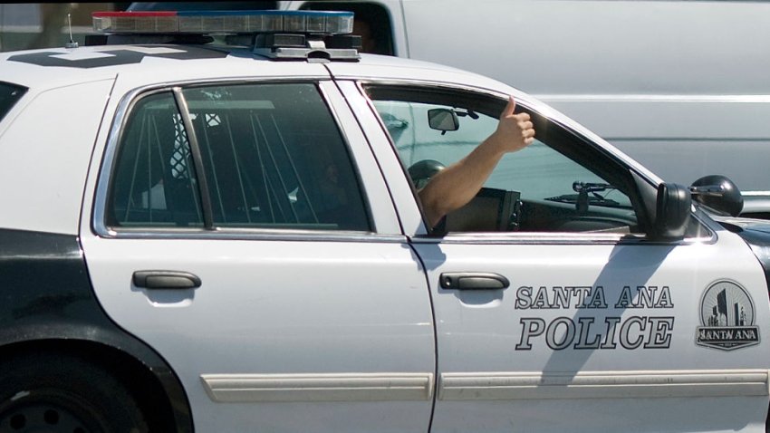 File Image: A Santa Ana police officer gives thumbs-up.