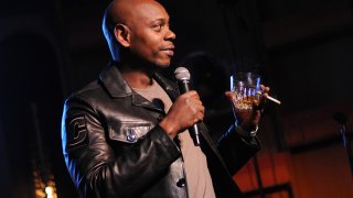 In this Sept. 23, 2018, file photo, Dave Chappelle performs at The Imagine Ball Honoring Serena Williams Benefitting Imagine LA Presented By John Terzian & Val Vogt in Los Angeles, California.