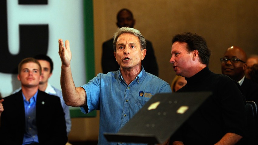 In this Sept. 22, 2010, file photo, Ed Buck (C) interrupts California Republican Party gubernatorial candidate Meg Whitman's campaign event in Los Angeles, California.