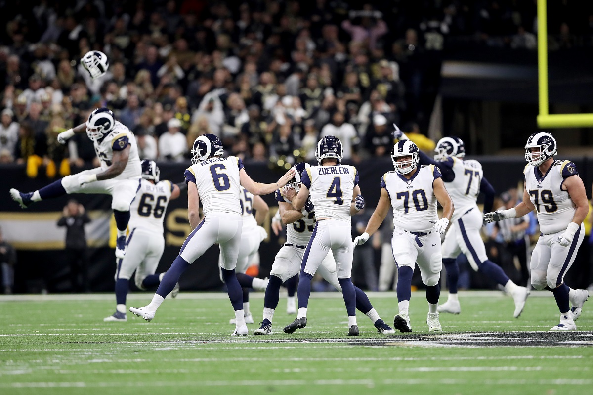 Los Angeles Rams kicker Greg Zuerlein holds the NFC trophy in the locker  room after overtime of the NFL football NFC championship game against the  New Orleans Saints, Sunday, Jan. 20, 2019