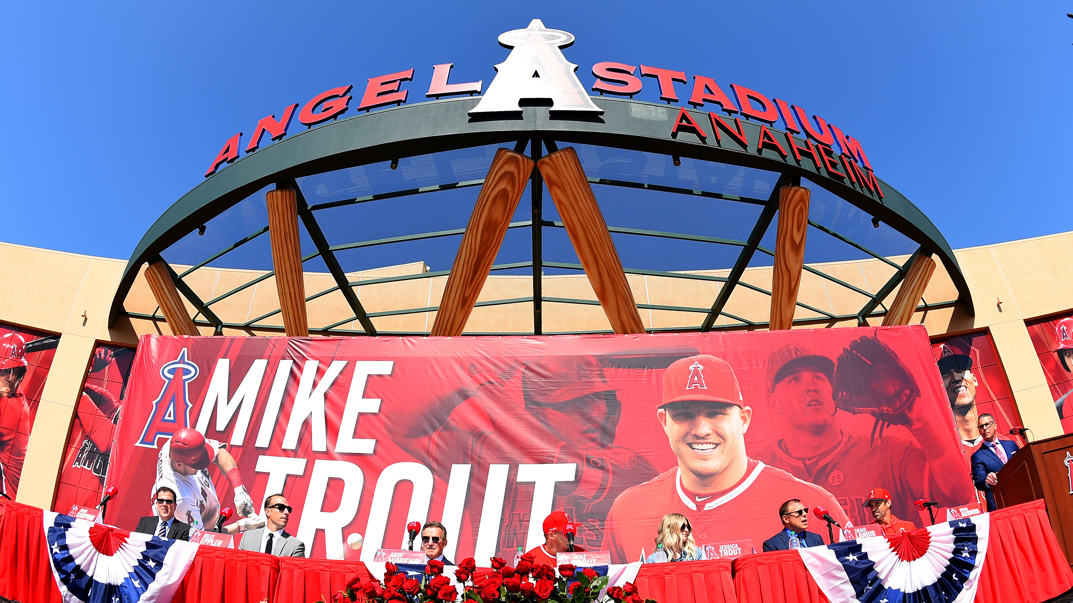ANAHEIM, CA - MARCH 24: Mike Trout #27 of the Los Angeles Angels of Anaheim, sits with his wife Jessica Trout as he attends a press conference after agreeing to the terms of a 12-year, $430 million contract extension at Angel Stadium of Anaheim on March 24, 2019 in Anaheim, California. (Photo by Jayne Kamin-Oncea/Getty Images)