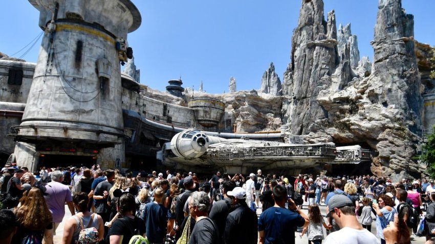 Visitors to Black Spire Outpost wait in line for the Millennium Falcon: Smugglers Run ride on opening day at Star Wars: Galaxy’s Edge at Disneyland in Anaheim, CA, on Friday, May 31, 2019.