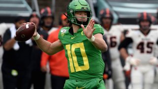 EUGENE, OREGON – NOVEMBER 30: Quarterback Justin Herbert #10 of the Oregon Ducks passes the ball during the first half of the game against the Oregon State Beavers at Autzen Stadium on November 30, 2019 in Eugene, Oregon. (Photo by Steve Dykes/Getty Images)