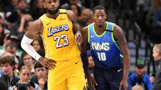 LeBron James #23 of the Los Angeles Lakers plays defense against Dorian Finney-Smith #10 of the Dallas Mavericks on January 10, 2020 at the American Airlines Center in Dallas, Texas.