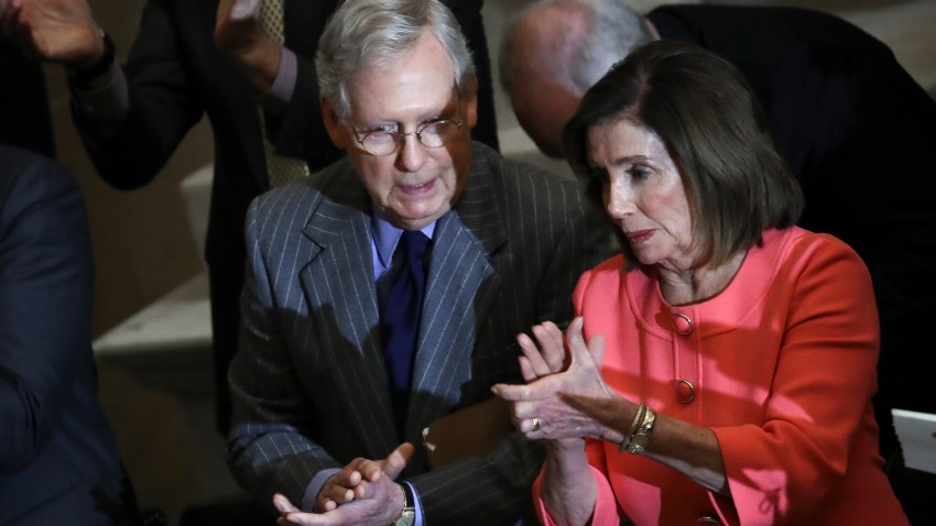 WASHINGTON, DC JANUARY 15: (L-R) Speaker of the House Nancy Pelosi and Senate Majority Leader Mitch McConnell briefly speak with each other as they attend a Congressional Gold Medal ceremony at the U.S. Capitol on January 15, 2020 in Washington, DC. Congress awarded the Congressional Gold Medal to former NFL player and advocate for patients with Lou Gehrig's disease (ALS) Steve Gleason.