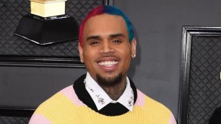 FILE - Rapper Chris Brown and arrives for the 62nd Annual Grammy Awards on Jan. 26, 2020, in Los Angeles.