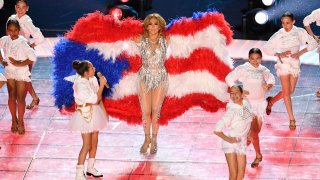 Jennifer Lopez and Emme Maribel Muñiz, left, performs during the halftime show of Super Bowl LIV between the Kansas City Chiefs and the San Francisco 49ers at Hard Rock Stadium in Miami Gardens, Florida, on Feb. 2, 2020.