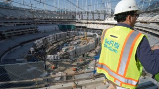 INGLEWOOD, CA – JANUARY 22: The giant Oculus 2-sided video board is being assembled inside on the floor of SoFi Stadium as roofing panels begin to cover the entire structure as it nears completion in Inglewood on Wednesday, Jan. 22, 2020. The stadium will open in the summer. (Photo by Scott Varley/MediaNews Group/Torrance Daily Breeze via Getty Images)