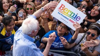 Democratic presidential candidate Sen. Bernie Sanders greets supporters during a campaign rally in Santa Ana, Calif.
