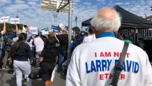 Jeff Jones, 77, wearing his "I am not Bernie Sanders" sweater, attends a Bernie Sanders rally at a Santa Ana, California, high school on February 21, 2020. - Up until a few years ago, Jeff Jones was going about his life, minding his own business and enjoying his passion for music. Then Bernie Sanders burst onto the national political stage, prompting many to do double takes on seeing Jones, who bears a striking resemblance to the Democratic presidential candidate.