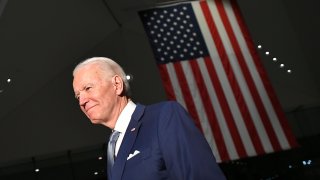 In this March 10, 2020, file photo, Democratic presidential hopeful former Vice President Joe Biden walks out after speaking at the National Constitution Center in Philadelphia, Pennsylvania.