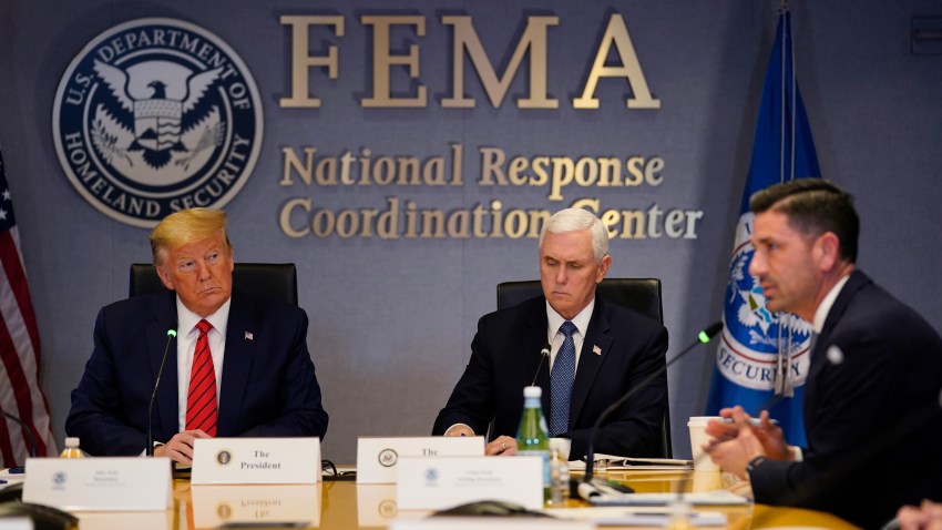 President Donald Trump, left, and Vice President Mike Pence listen as Acting Secretary of Homeland Security Chad Wolf speaks during a teleconference with governors at the Federal Emergency Management Agency headquarters on March 19, 2020, in Washington, DC.