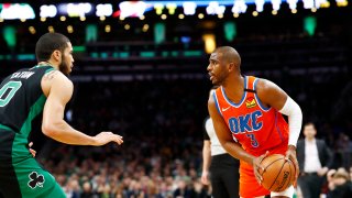 Jayson Tatum of the Boston Celtics defends Chris Paul of the Oklahoma City Thunder during the first quarter of the game at TD Garden on March 8, 2020, in Boston.