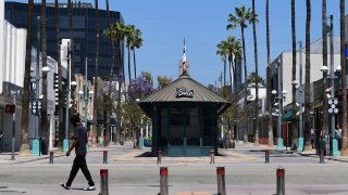 Businesses remain closed along the Third Street Promenade shopping street in Santa Monica.