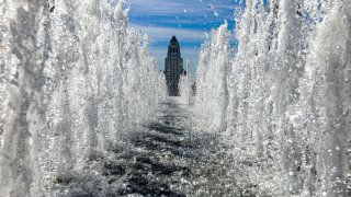 The splash pad fountain at Music Center Plaza is unusually empty.