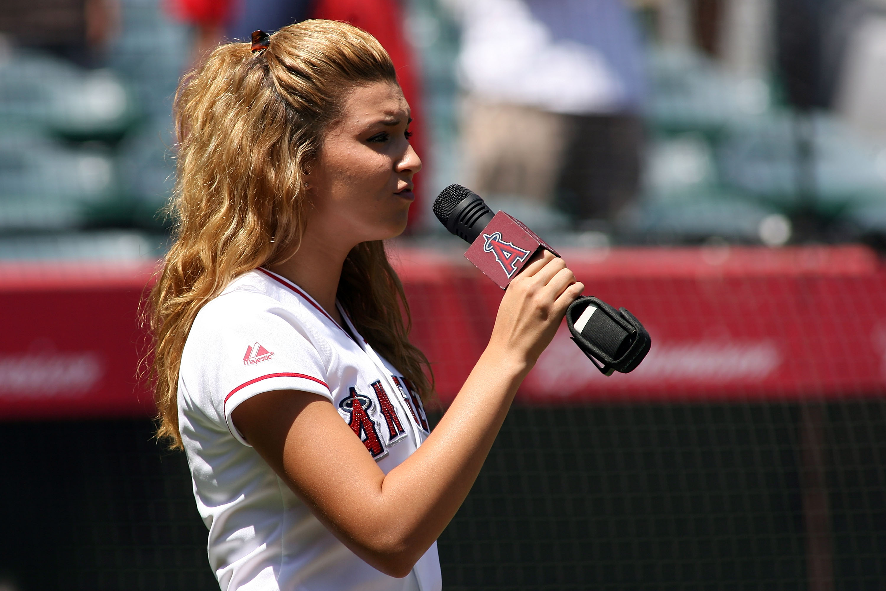 ANAHEIM, CA - AUGUST 21: Tori Kelly sings the National Anthem before the game between the Baltimore Orioles and the Los Angeles Angels of Anaheim at Angel Stadium on August 21, 2011 in Anaheim, California. (Photo by Jeff Golden/Getty Images)
