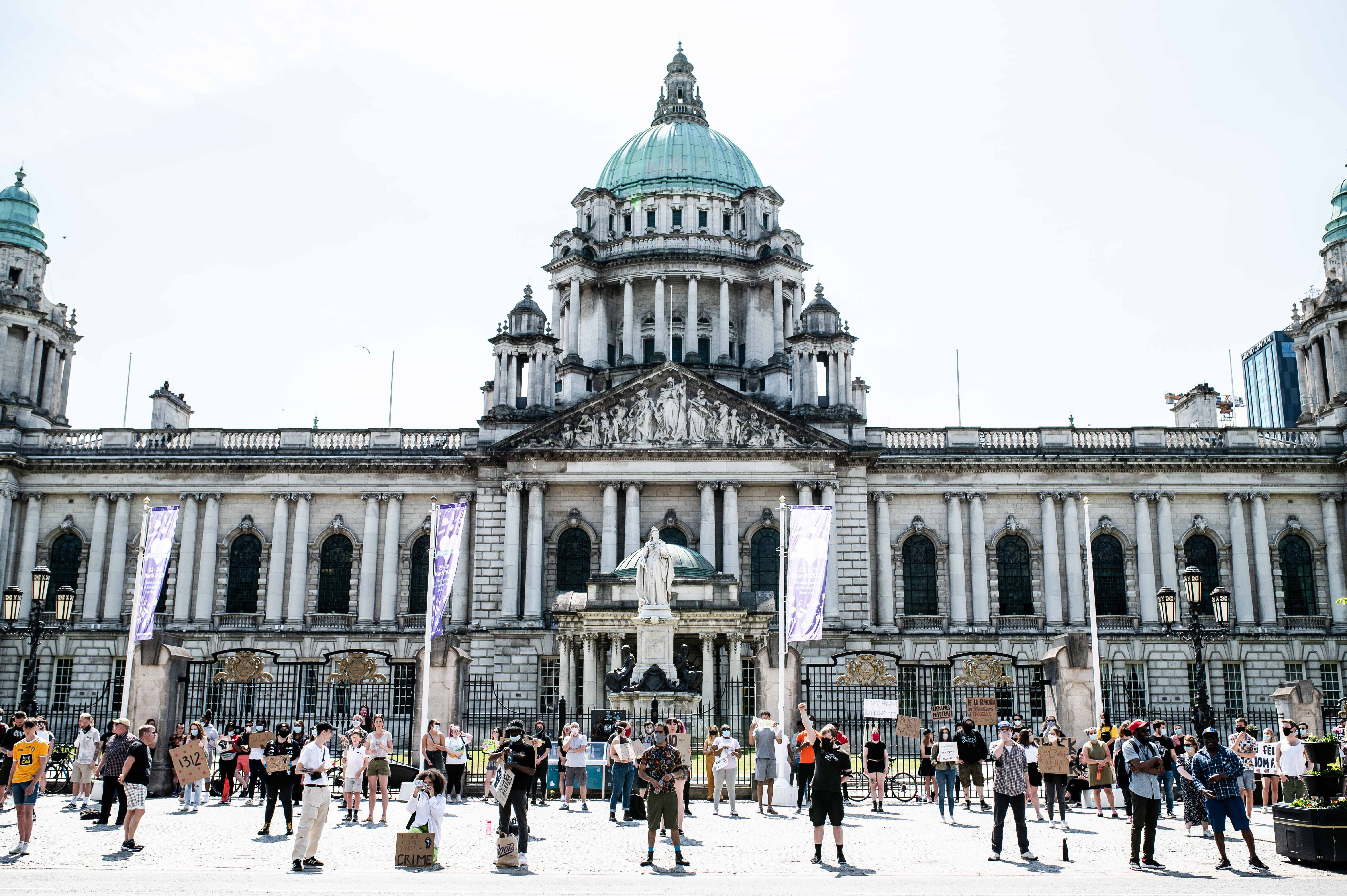 People take part in a demonstration at Belfast City Hall on June 1, 2020, in Belfast, United Kingdom. The death of an African-American man, George Floyd, while in the custody of Minneapolis police has sparked protests across the United States, as well as demonstrations of solidarity in many countries around the world.