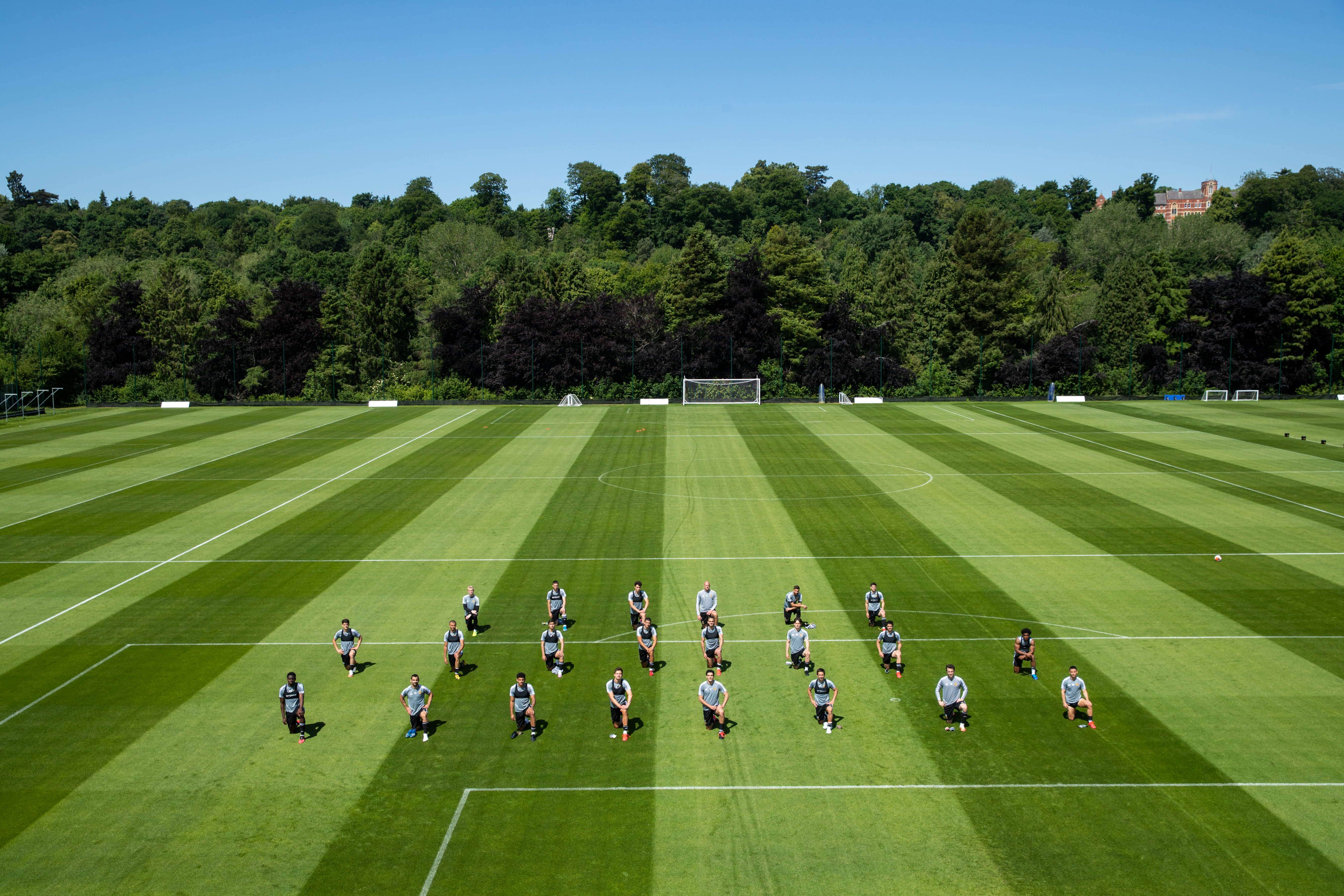 Wolverhampton Wanderers players take the knee in memory of George Floyd in a training session at Sir Jack Hayward Training Ground on June 2, 2020 in Wolverhampton, England.