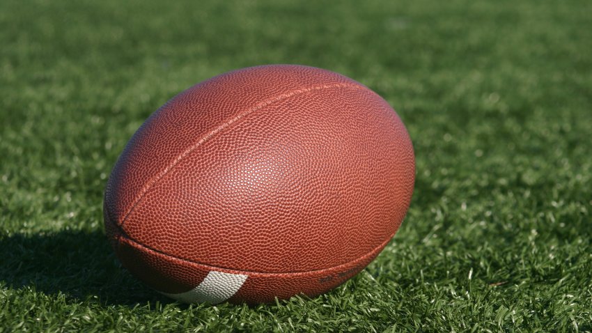 football on fake grass type turf