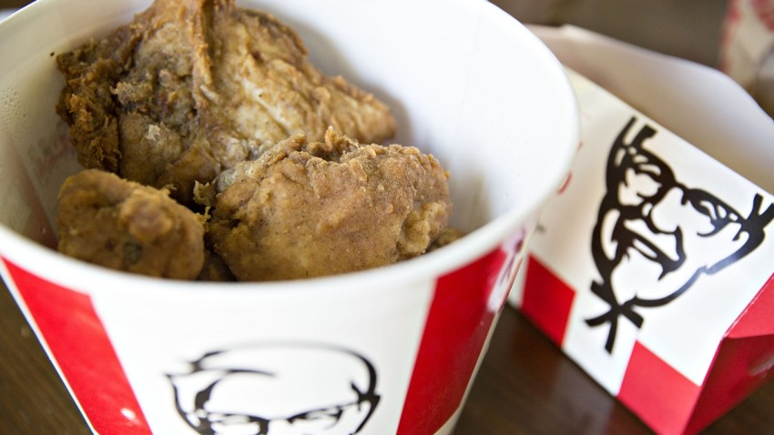 YUM BRANDS EARNS