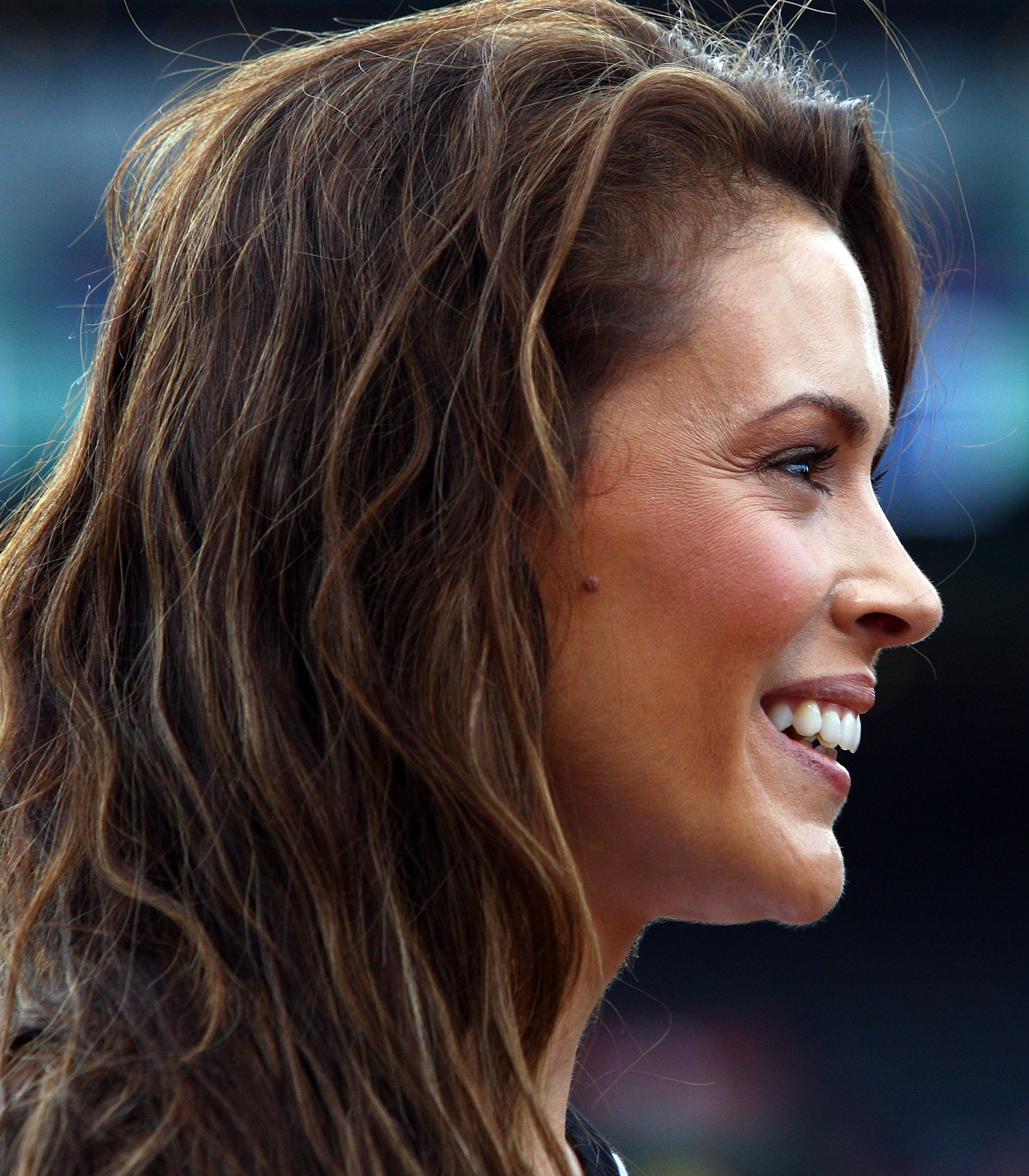 BOSTON - OCTOBER 03: Actress Alyssa Milano stands on the field before the Boston Red Sox take on the Los Angeles Angels of Anaheim during Game One of the American League Division Series on October 3, 2007 at Fenway Park in Boston, Massachusetts. (Photo by Elsa/Getty Images)