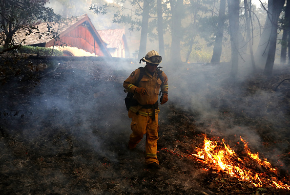 Firefighter dodges flames