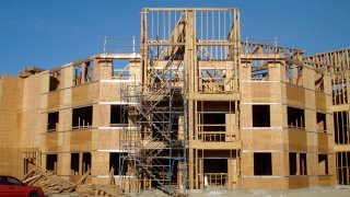 a construction site showing a wooden structure