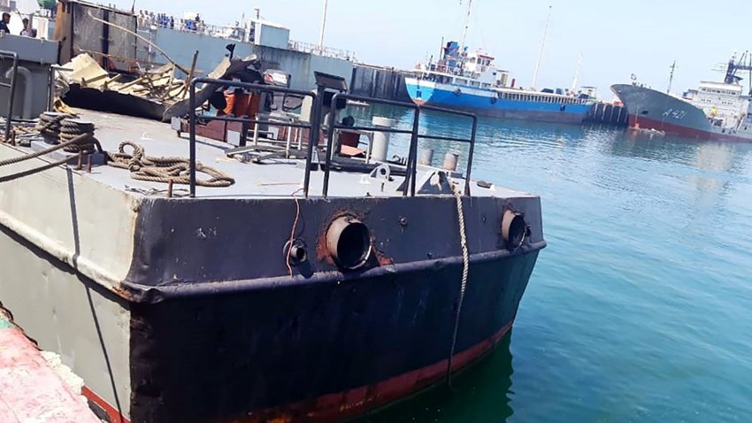 A handout picture provided by Iranian army official website on May 11, 2020, shows the damaged Konarak vessel, hit by a friendly fire missile during naval exercises, docked at the Jask port in the southern Hormozgan province.