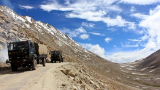 In this Aug. 5, 2012, file photo, an Indian army convoy moves towards the border in Pangong, a disputed territory between India and China, in Ladakh, Indian-administered Kashmir.