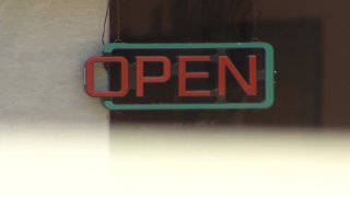 business neon open sign unlit