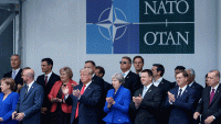 In this July 11, 2018, file photo, NATO leaders, including President Donald Trump, applaud after posing for a family photo during the NATO (North Atlantic Treaty Organization) summit at the NATO headquarters in Brussels.