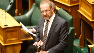 New Zealand Justice Minister Andrew Little speaks to lawmakers in Wellington, New Zealand Wednesday, March 18, 2020. Lawmakers voted in favor of a landmark bill that treats abortion as a health issue rather than a crime.