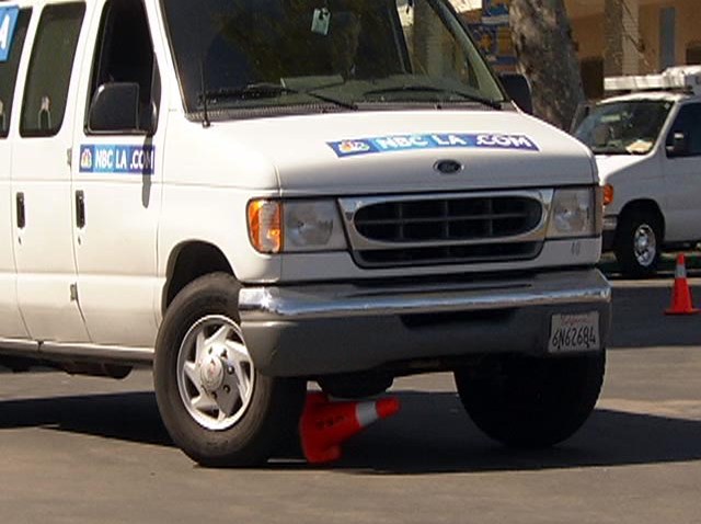 Patrick Healy drives over a cone