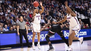 Crystal Dangerfield #5 of the UConn Huskies during the American Athletic Conference women's basketball championship at Mohegan Sun Arena