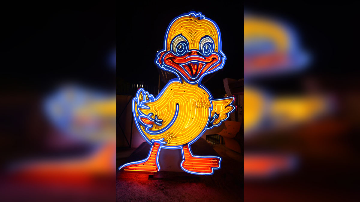 Say Watt? Iconic Ugly Duckling Sign Returns to Las Vegas Neon Museum ...