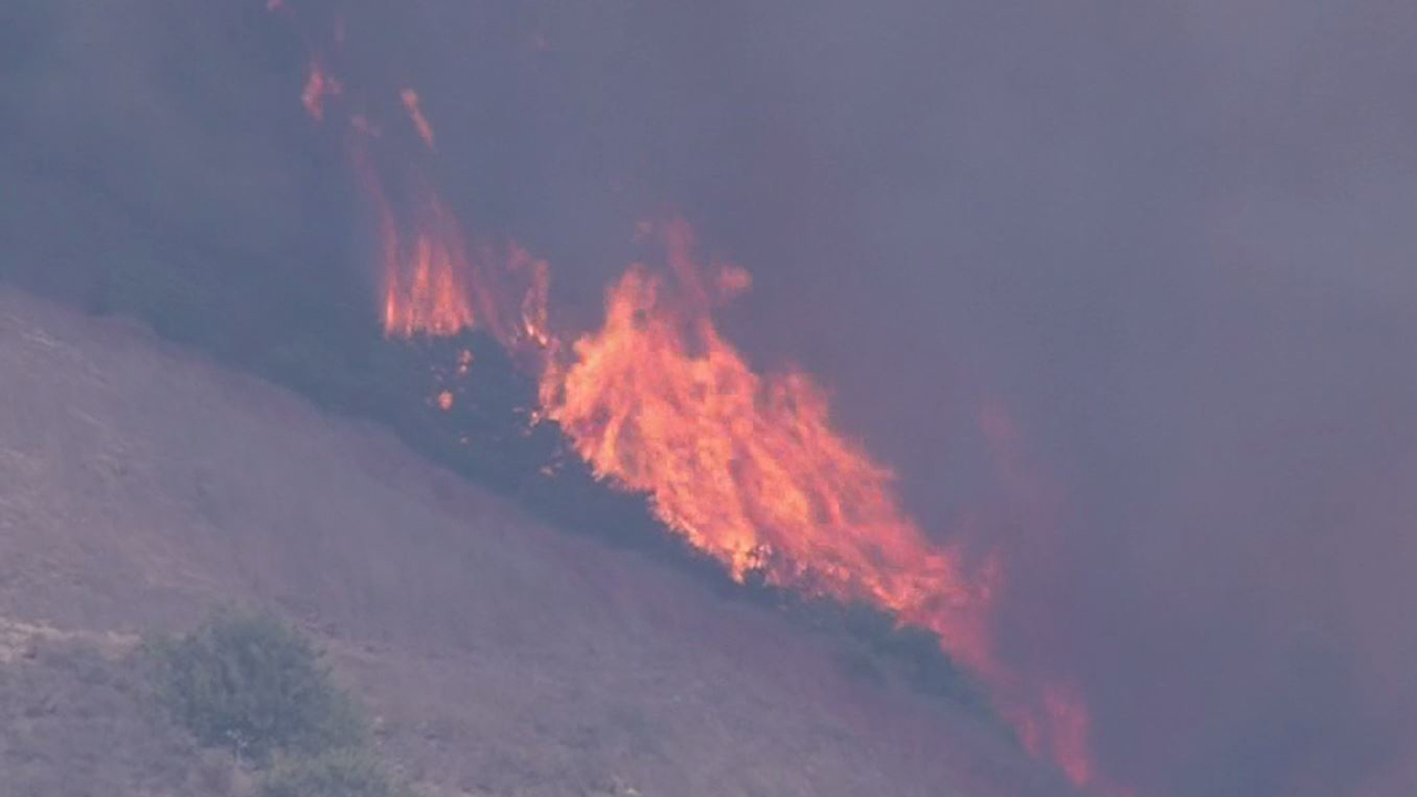 Flames from the Aliso Fire are pictured Saturday June 2, 2018.