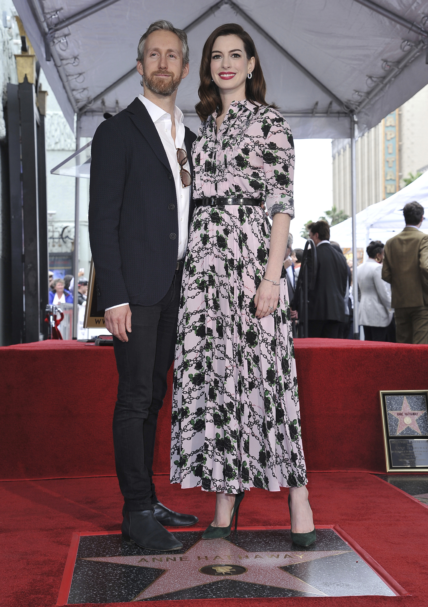 Actress Anne Hathaway, right, and her husband Adam Shulman pose atop her new star on the Hollywood Walk of Fame following a ceremony on Thursday, May 9, 2019, in Los Angeles. (Photo by Richard Shotwell/Invision/AP)